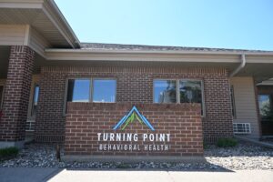 Exterior photo of Turning Point Behavioral Health's building and sign.
